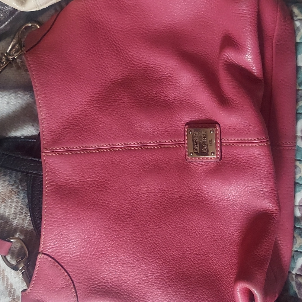 Woman's pink  dooney & bourke purse